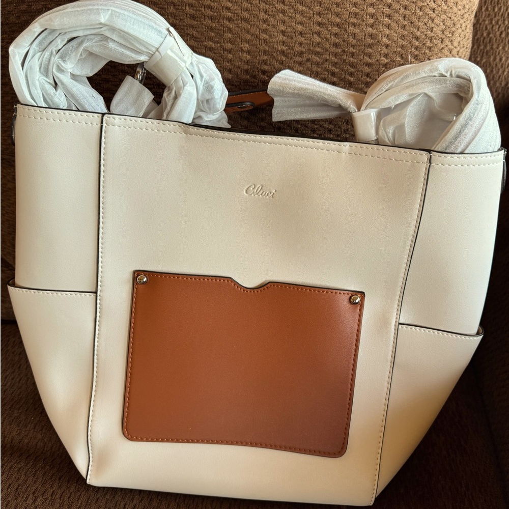 Cluci brand new bucket purse cream with tan accents